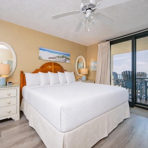 Experience restful nights in the king master suite, where plush bedding beckons after a day of beachside fun