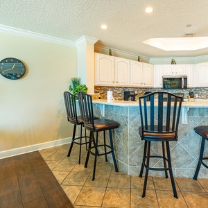 Take a seat at the breakfast bar and share laughs while morning coffee brews nearby