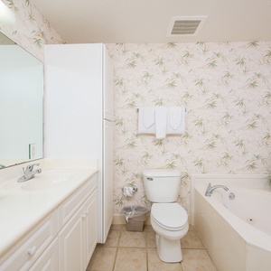 Refresh in the master bath after a day of adventure with a soothing jetted tub and relaxing walk-in shower