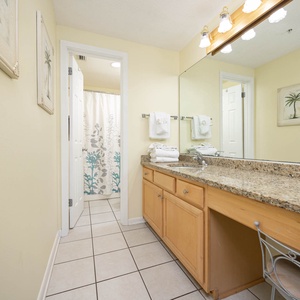 Inviting atmosphere for your morning routine in the master bath with spacious vanity and tub-shower combo