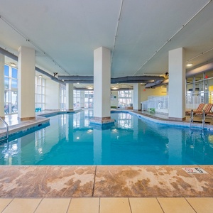 Take a dip in the indoor pool with a view through the large windows offering a refreshing retreat during your stay