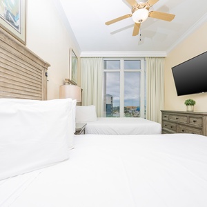 Unwind in this queen guest suite and stream your favorite shows or enjoy a good movie after a beach day
