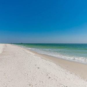 Discover stunning beachfront views with soft white sands and gentle waves, perfect for relaxation and beach activities