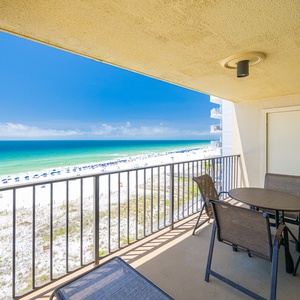 Relax on your balcony, sipping your favorite drink while enjoying beach views and the soothing sounds of the shore