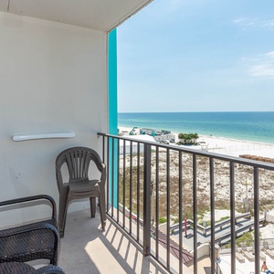 Enjoy the stunning beachfront view from this inviting balcony, perfect for relaxation and soaking in the scenery