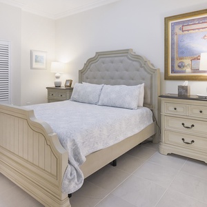 Admire the ornate map print above the dresser in this king guest suite and relax