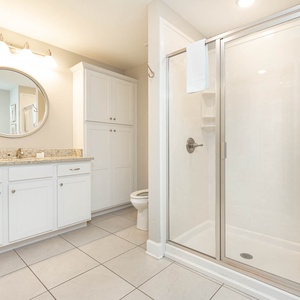 Experience effortless mornings in this guest bath, where this elegant space enhances your refreshing shower routine