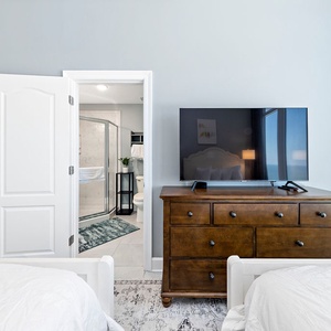 Relax on the queen beds in this guest suite, stream shows on the TV, and refresh in the en-suite shower