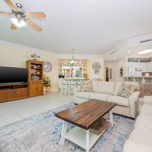 Unwind in the airy living space, where comfort meets inviting decor, perfect for quality time spent with loved ones