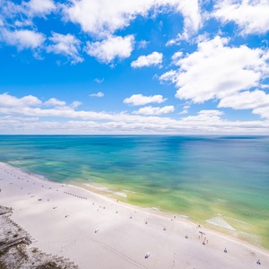 Gaze out from your balcony, enjoying tranquil coastal views as you soak in the refreshing beach vibes
