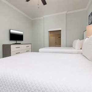 Unwind in this queen guest suite and stream your favorite shows or enjoy a good movie after a beach day