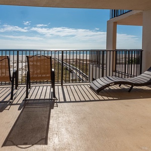 Sit back and enjoy the beautiful views of the water from your beachfront balcony