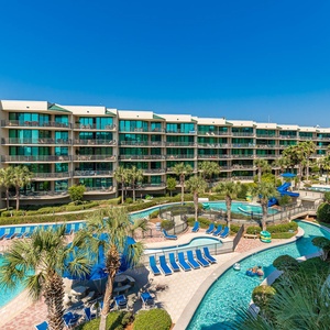 Discover the pool area with a refreshing lazy river and thrilling waterslide, just steps from the bay