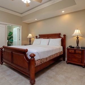 Unwind after a day at the beach in this elegant king master suite surrounded by stylish accents