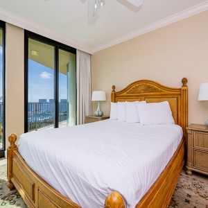 Awaken in a comfortable queen bed, and savor stunning bay views through expansive balcony doors