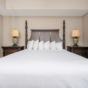 Unwind after a day at the beach in this elegant king master suite surrounded by stylish coastal accents