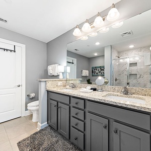 Start your day with a refreshing shower or soak in the soothing tub in the master bath