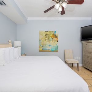 Sink into the king bed in the guest room for restful nights, surrounded by inviting decor and soothing coastal vibes