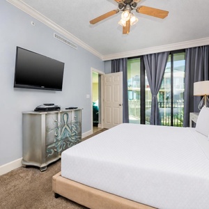 Unwind after a fun vacation day and stream your favorite shows in the king master suite with balcony access