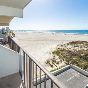 Breathe in the relaxing coastal vibe from your balcony while taking in stunning views of the beach and morning sun