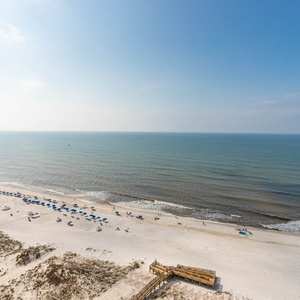 Follow the wooden boardwalk to the beach, breathe gulf air, and listen to the sound of the waves and seagulls