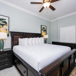 Retreat to this elegant king master suite with cozy bedding and drift off into a peaceful slumber