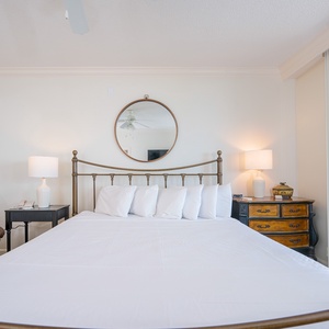 Enjoy restful nights in the master suite with soft king bedding and fluffy pillows