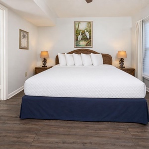 Sink into crisp linens and peaceful quiet in this king suite