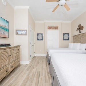 Unwind in this queen guest suite and stream your favorite shows or enjoy a good movie after a beach day