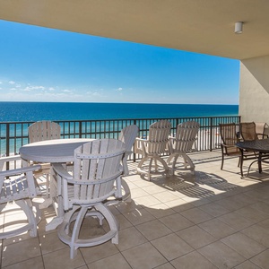 Bask in the sun on your balcony, savoring the panoramic beach views while lounging on comfortable seating