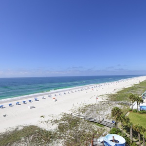 Experience seemingly endless coastline views of the horizon as waves lap the shore and the sun glistens over the water