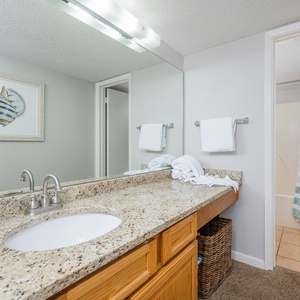 Refresh in the spacious master bath featuring a large vanity, stylish decor, and a relaxing shower area