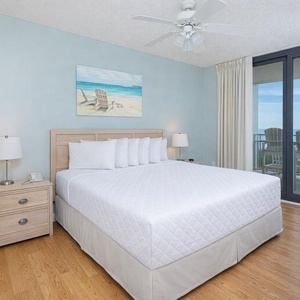 Experience serenity in the king master suite, where soft bedding awaits and coastal views welcome your arrival