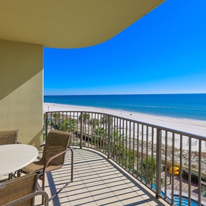Breathe in the beach air from your balcony, enjoying relaxation and magnificent coastline views during your getaway