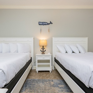 Rest peacefully in comfortable queen beds, surrounded by a tranquil vibe that welcomes sweet dreams after beach days