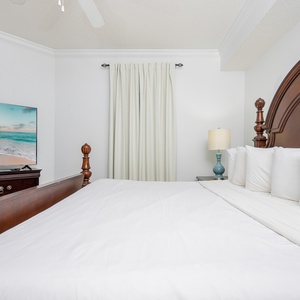 Relax on the cozy king bed in this guest suite and stream your favorite shows after a fun vacation day