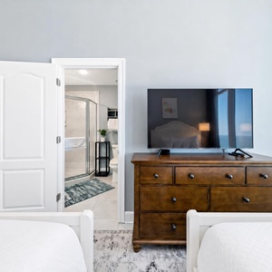 Relax on the queen beds in this guest suite, stream shows on the TV, and refresh in the en-suite shower