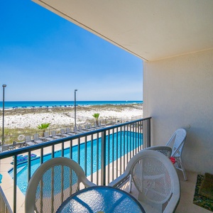 Take in the vibrant pool views and refreshing beach vibes from your beach front balcony