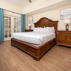 Rest in serenity in this king master suite, while the decor invites relaxation after a day at the beach