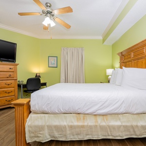 Relax on the cozy queen bed in this guest suite and stream your favorite shows after a fun vacation day