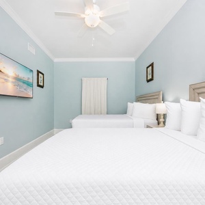 Unwind in this cozy queen guest room with your favorite shows and sleep peacefully