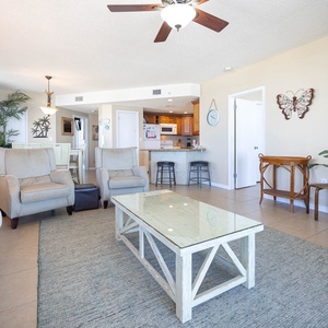 Relax in the spacious living area, featuring a sofa with queen sleeper, stylish coffee table, and a welcoming atmosphere