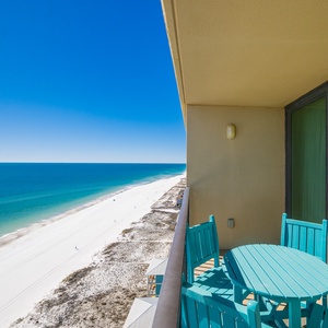 Your balcony invites you to savor the endless blue horizon and lively beach below