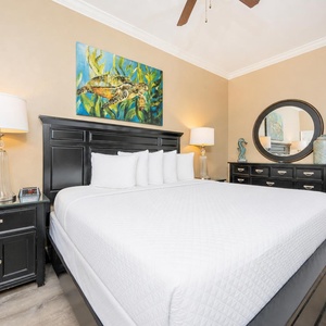 Fall into blissful rest on the plush bedding of this inviting king guest suite, surrounded by serene decor and soothing art