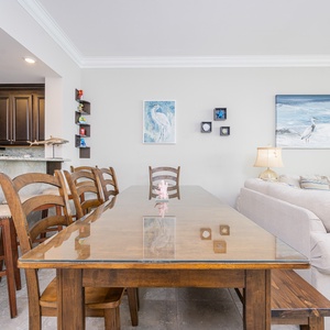 Gather around the spacious dining table, perfect for playful game nights or sharing stories with loved ones