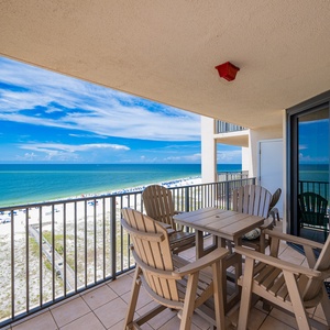 Relax on the balcony enjoying panoramic views of the tranquil water and inviting beach below