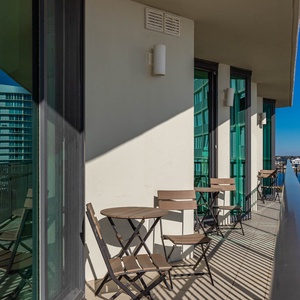 Enjoy your morning coffee on the charming balconies from each suite in this condo with stunning views from all