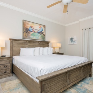 Unwind in this relaxing king guest suite and drift off into a peaceful slumber with fun coastal decor