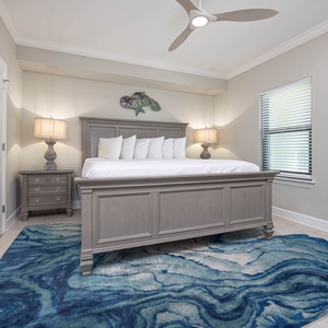 Slip into the fluffy king bed, enveloped in tranquility, and drift into restful dreams in this serene guest suite