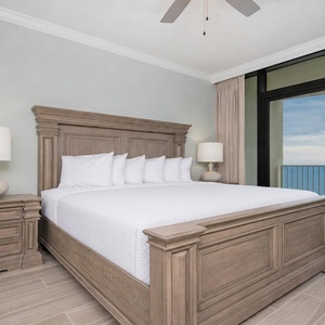 Experience restful nights in this master bedroom, featuring a king bed and beachfront balcony access